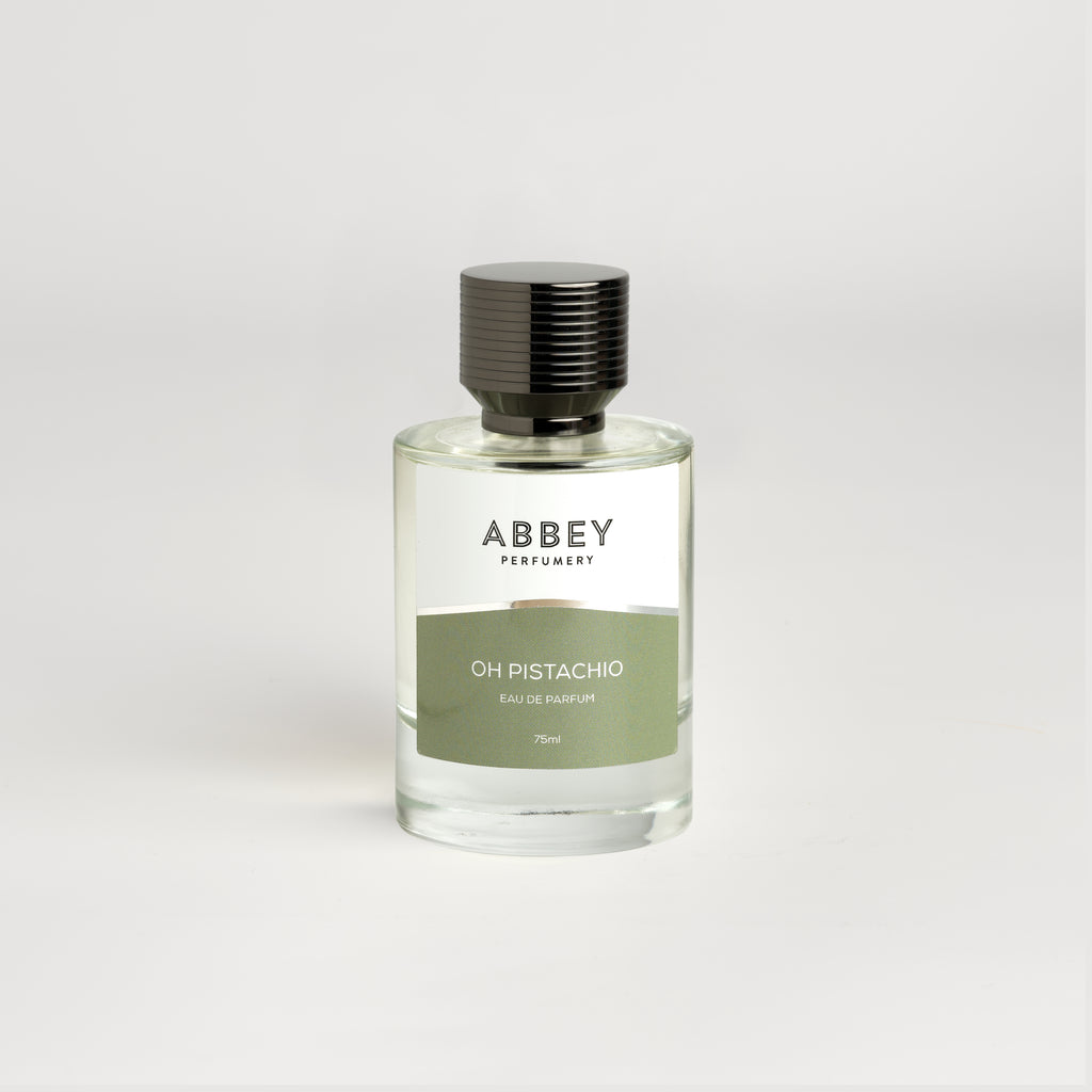 Oh Pistachio perfume bottle 75ml on white background