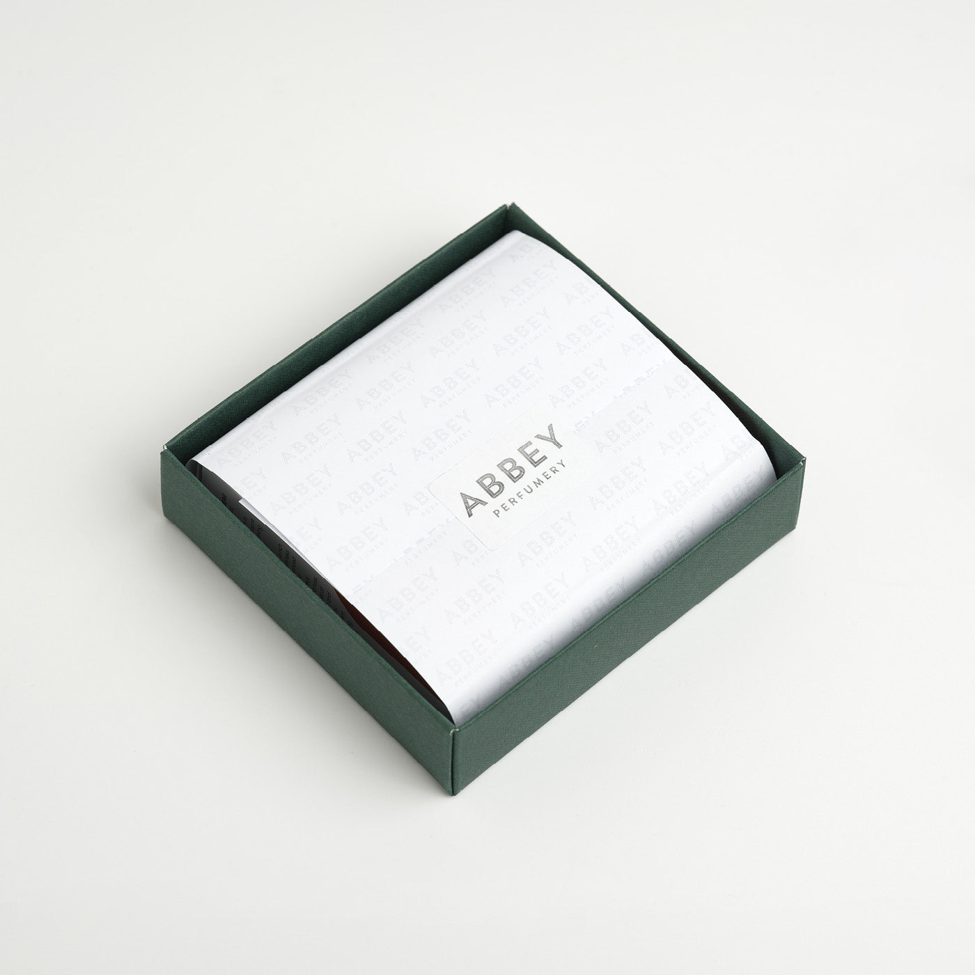 Four boxed 10ml bottles beautifully wrapped in branded tissue paper with a Foil Abbey Perfumery sticker