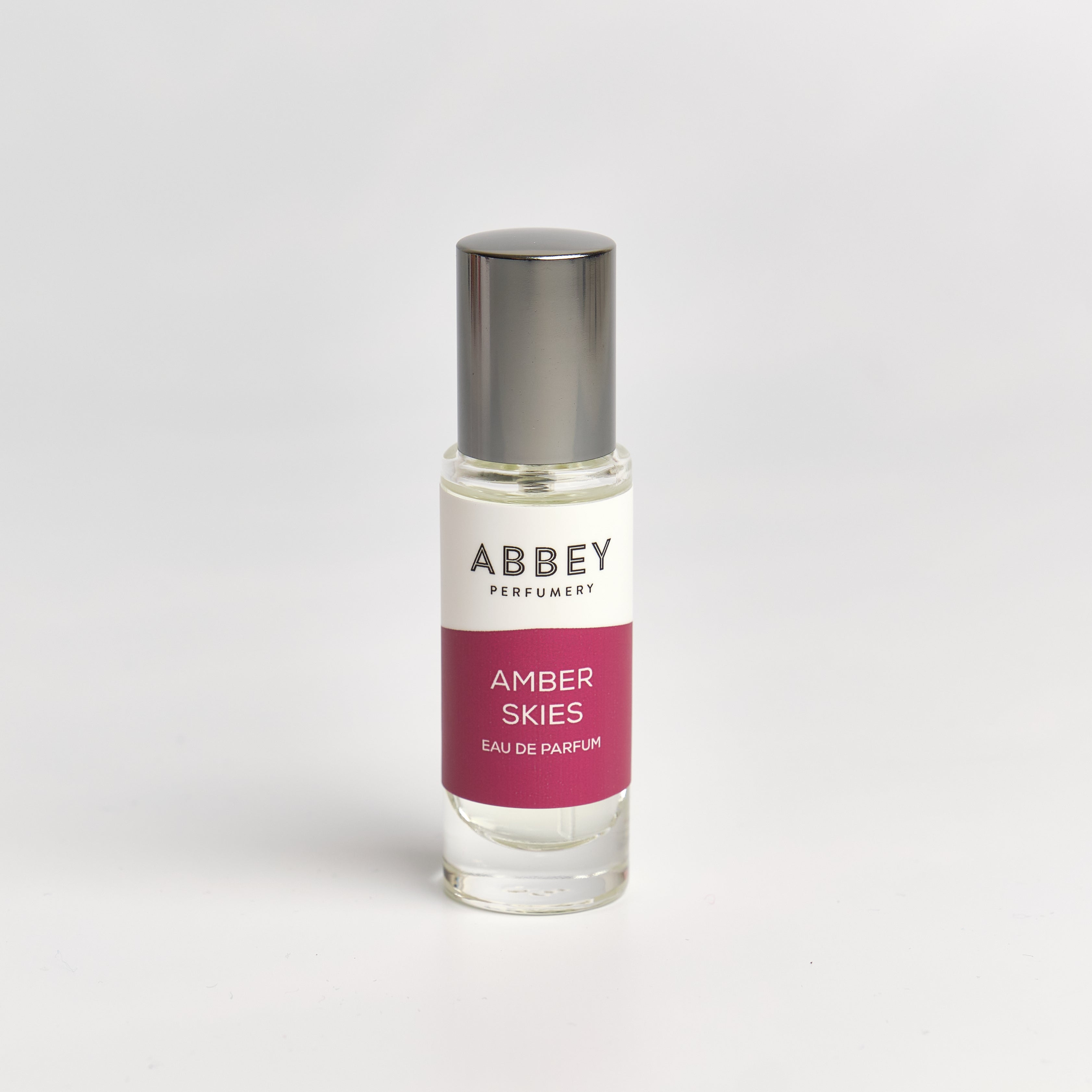 Amber Skies perfume bottle 10ml on white background