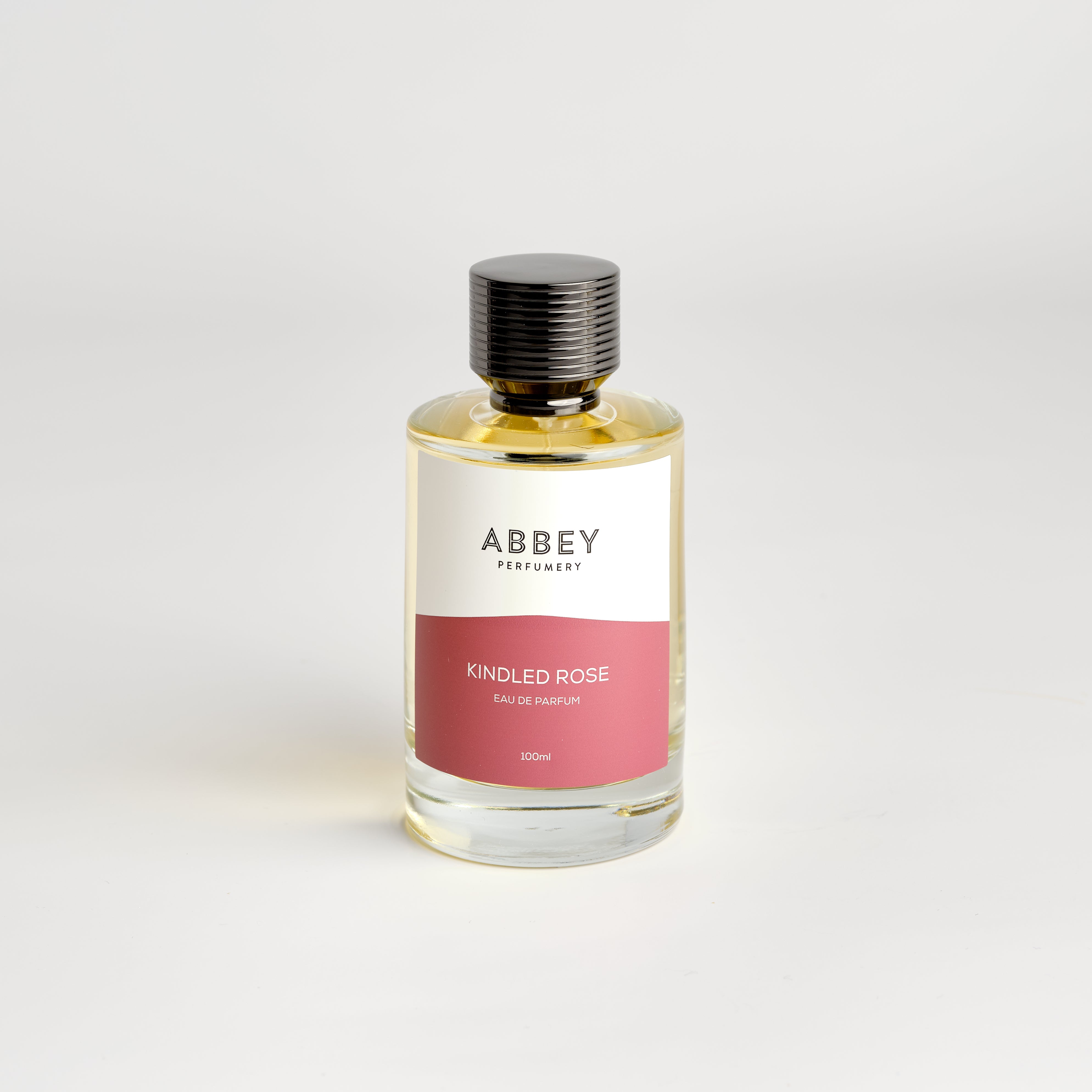 Kindled Rose perfume bottle 100ml on white background