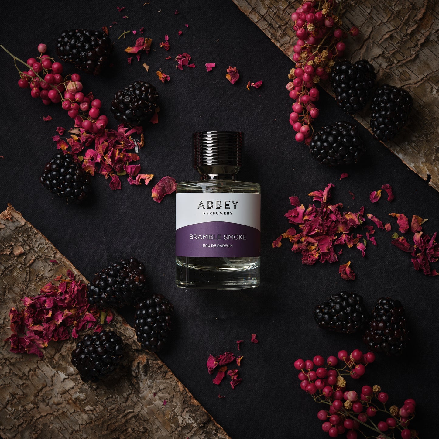 Bramble Smoke perfume bottle on luxurious background