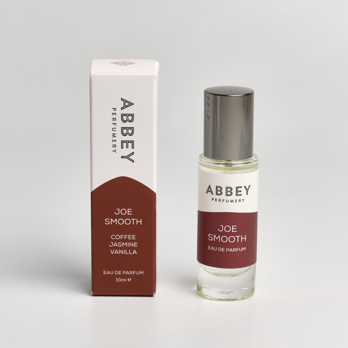 Joe Smooth perfume bottle and box 10ml on white background