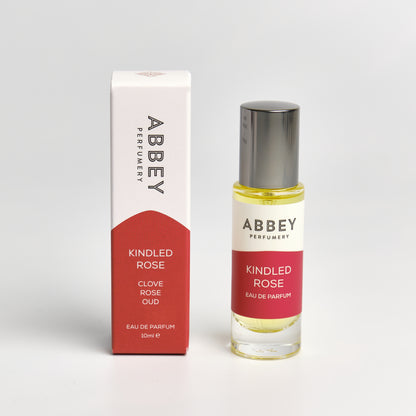 Kindled Rose perfume bottle and box 10ml on white background