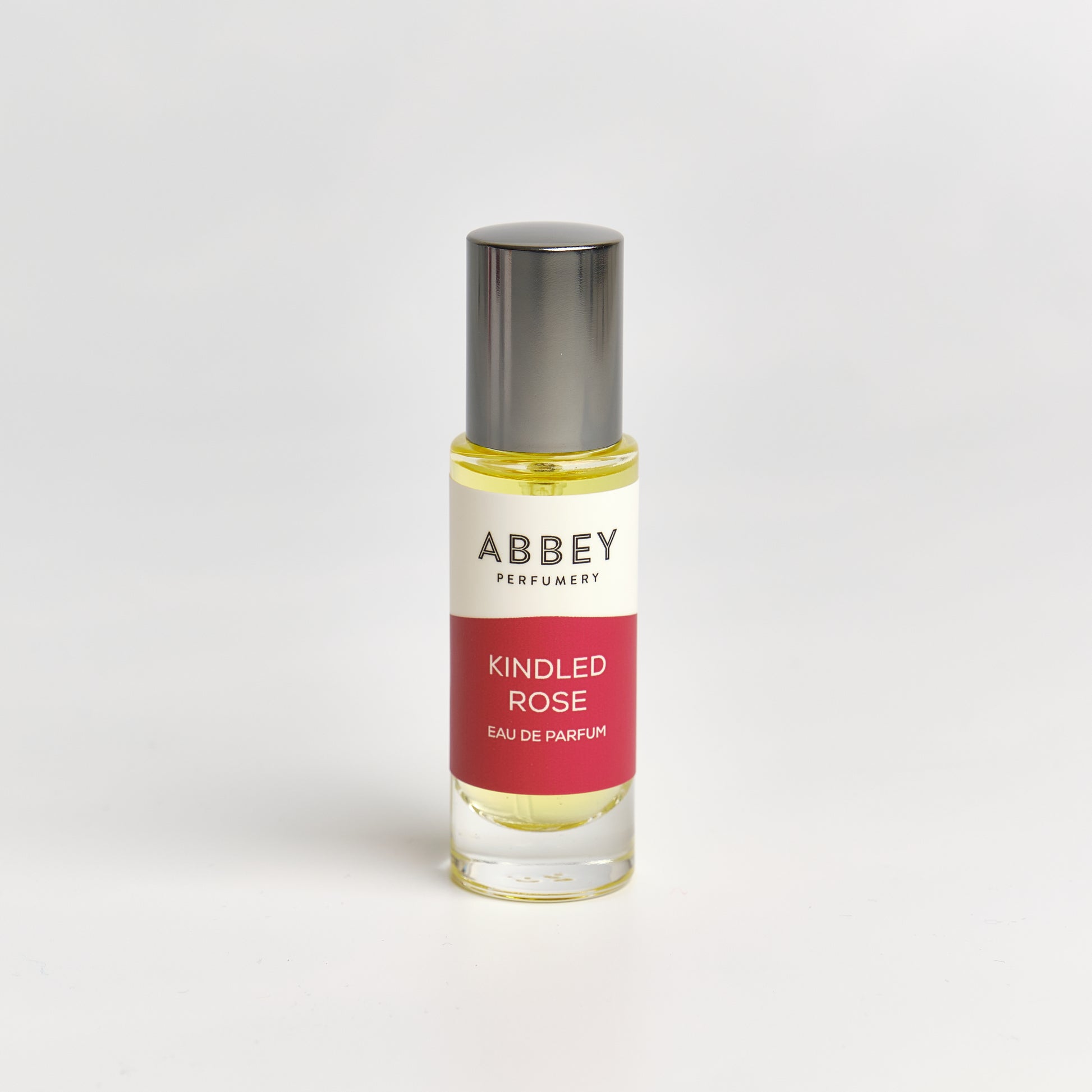 Kindled Rose perfume bottle 10ml on white background