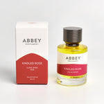 Kindled Rose perfume bottle and box 50ml on white background