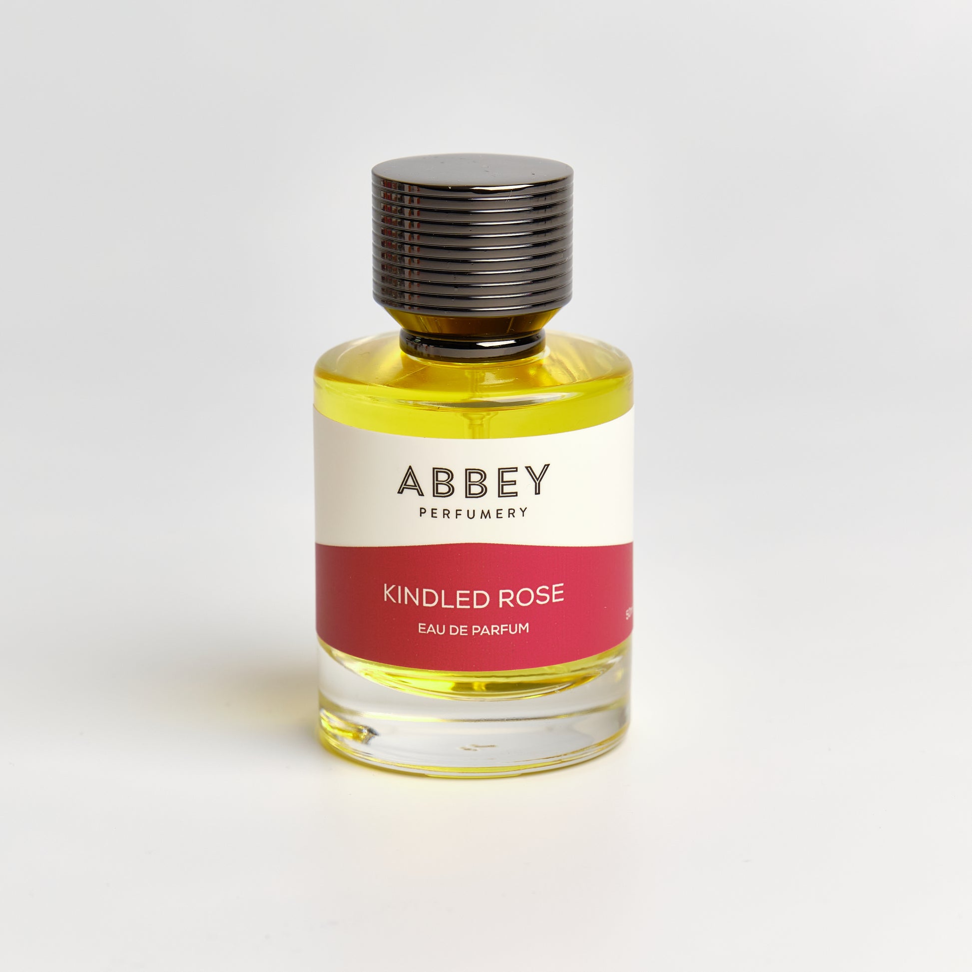 Kindled Rose perfume bottle 50ml on white background