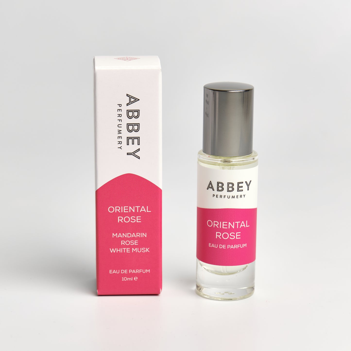 Oriental Rose perfume bottle and box 10ml on white background
