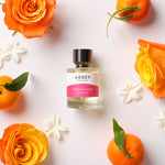 Oriental Rose perfume bottle with Mandarin and Jasmine petals